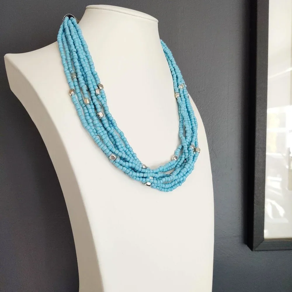 8 strand blue and silver beaded necklace
